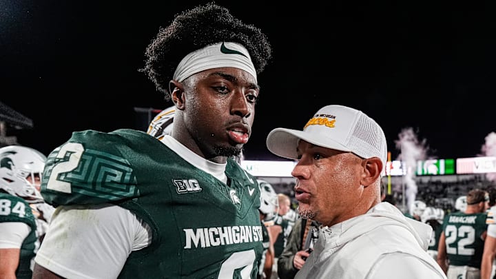 Michigan State quarterback Aidan Chiles (2) talks to Western Michigan head coach Lance Taylor after 23-6 win at Spartan Stadium in East Lansing on Friday, August 29, 2025.