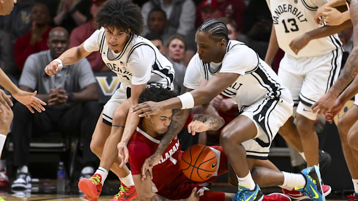 Jan 7, 2026; Nashville, Tennessee, USA; Vanderbilt Commodores guard Tyler Tanner (3), guard Mike James (0) and Alabama Crimson Tide guard Jalil Bethea (1) fight for the loose ball during the second half at Memorial Gymnasium. Mandatory Credit: Steve Roberts-Imagn Images Jan 7, 2026; Nashville, Tennessee, USA; Vanderbilt Commodores guard Tyler Tanner (3), guard Mike James (0) and Alabama Crimson Tide guard Jalil Bethea (1) fight for the loose ball during the second half at Memorial Gymnasium. Mandatory Credit: Steve Roberts-Imagn Images