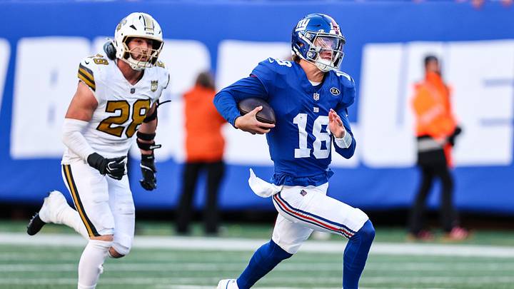 Oct 18, 2026; East Rutherford, New Jersey, USA; New York Giants quarterback J.J. McCarthy (18) scrambles for yards as New Orleans Saints linebacker Danny Stutsman (28) pursues during the second half at MetLife Stadium. Oct 18, 2026; East Rutherford, New Jersey, USA; New York Giants quarterback J.J. McCarthy (18) scrambles for yards as New Orleans Saints linebacker Danny Stutsman (28) pursues during the second half at MetLife Stadium.