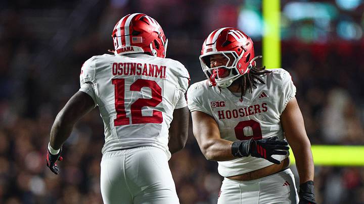 Oct 3, 2026; Piscataway, New Jersey, USA; Indiana Hoosiers defensive lineman Stephen Daley (9) celebrates a sick with defensive end Tobi Osunsanmi (12) during the second half against the Rutgers Scarlet Knights at SHI Stadium. Mandatory Credit: Vincent Carchietta-Imagn Images