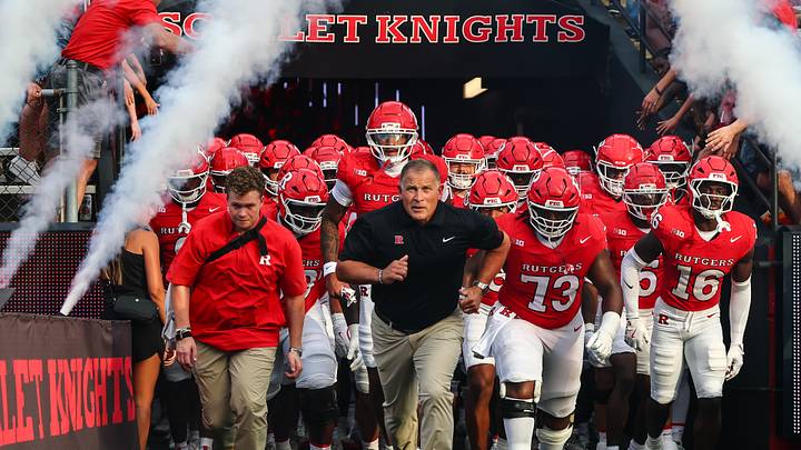 Sep 3, 2026; Piscataway, New Jersey, USA; Rutgers Scarlet Knights head coach Greg Schiano runs on to the field with his team before the game against the Massachusetts Minutemen at SHI Stadium. Mandatory Credit: Vincent Carchietta-Imagn Images Sep 3, 2026; Piscataway, New Jersey, USA; Rutgers Scarlet Knights head coach Greg Schiano runs on to the field with his team before the game against the Massachusetts Minutemen at SHI Stadium. Mandatory Credit: Vincent Carchietta-Imagn Images