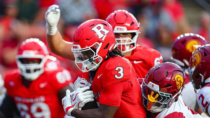 Sep 19, 2026; Piscataway, New Jersey, USA; Rutgers Scarlet Knights running back Antwan Raymond (3) is tackled by USC Trojans linebacker Desman Stephens II (8) during the second half at SHI Stadium. Mandatory Credit: Vincent Carchietta-Imagn Images Sep 19, 2026; Piscataway, New Jersey, USA; Rutgers Scarlet Knights running back Antwan Raymond (3) is tackled by USC Trojans linebacker Desman Stephens II (8) during the second half at SHI Stadium. Mandatory Credit: Vincent Carchietta-Imagn Images