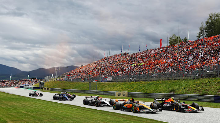 Sergio Perez of Mexico driving the (11) Oracle Red Bull Racing RB19 leads Oscar Piastri of Australia driving the (81) McLaren MCL60 Mercedes and Yuki Tsunoda of Japan driving the (22) Scuderia AlphaTauri AT04 on track during the F1 Grand Prix of Austria at Red Bull Ring on July 02, 2023 in Spielberg, Austria. Sergio Perez of Mexico driving the (11) Oracle Red Bull Racing RB19 leads Oscar Piastri of Australia driving the (81) McLaren MCL60 Mercedes and Yuki Tsunoda of Japan driving the (22) Scuderia AlphaTauri AT04 on track during the F1 Grand Prix of Austria at Red Bull Ring on July 02, 2023 in Spielberg, Austria.