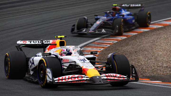 Liam Lawson, Racing Bulls, leads Carlos Sainz, Williams, through Turn 12 at the 2025 Formula 1 Dutch Grand Prix, Circuit Zandvoort, Zandvoort.