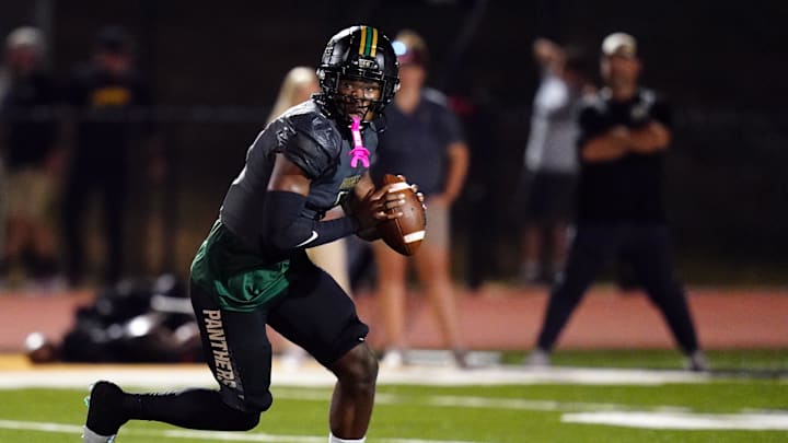 Oct 27, 2023; Fairburn, GA, USA; Langston Hughes Panthers quarterback Air Noland (1) scrambles out