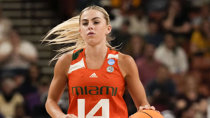 Mar 26, 2023; Greenville, SC, USA; Miami Hurricanes guard Haley Cavinder (14) during the second half against the LSU Lady Tigers in the NCAA Women   s Tournament at Bon Secours Wellness Arena. Mandatory Credit: Jim Dedmon-Imagn Images