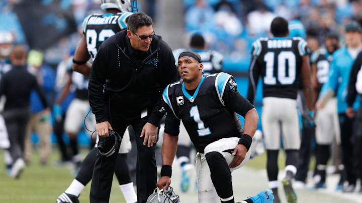 Dec 24, 2016; Charlotte, NC, USA; Carolina Panthers quarterback Cam Newton (1) talks with head coach Ron Rivera in the fourth quarter at Bank of America Stadium. The Falcons defeated the Panthers 33-16. Mandatory Credit: Jeremy Brevard-Imagn Images Dec 24, 2016; Charlotte, NC, USA; Carolina Panthers quarterback Cam Newton (1) talks with head coach Ron Rivera in the fourth quarter at Bank of America Stadium. The Falcons defeated the Panthers 33-16. Mandatory Credit: Jeremy Brevard-Imagn Images