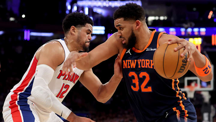 Apr 21, 2025; New York, New York, USA; New York Knicks center Karl-Anthony Towns (32) controls the ball against Detroit Pistons forward Tobias Harris (12) during the second quarter of game two of the first round of the 2024 NBA Playoffs at Madison Square Garden. Mandatory Credit: Brad Penner-Imagn Images