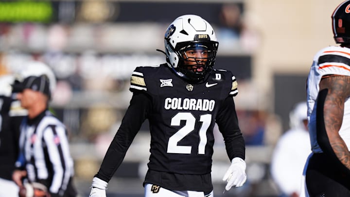 Nov 29, 2024; Boulder, Colorado, USA; Colorado Buffaloes safety Shilo Sanders (21) reacts in the second quarter against the Oklahoma State Cowboys at Folsom Field. Mandatory Credit: Ron Chenoy-Imagn Images