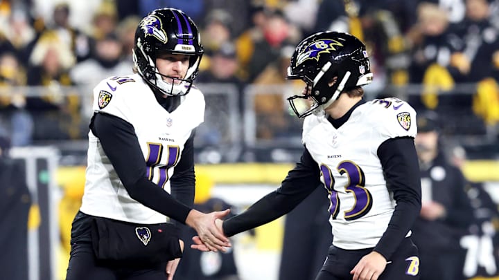 Jan 4, 2026; Pittsburgh, Pennsylvania, USA; Baltimore Ravens place kicker Tyler Loop (33) reacts with punter Jordan Stout (11) after making a field goal during the first half at Acrisure Stadium. Mandatory Credit: Charles LeClaire-Imagn Images