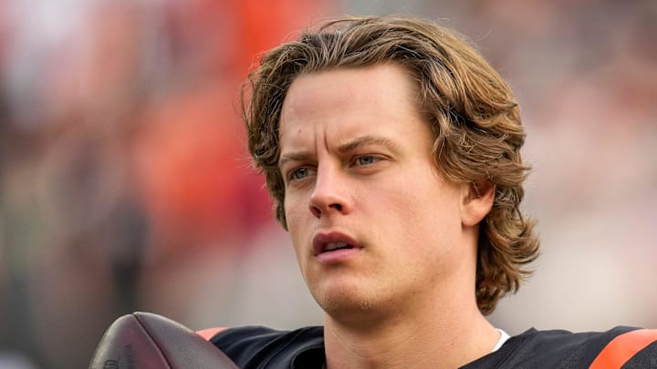 Cincinnati Bengals quarterback Joe Burrow (9) gets loose before the start of the first quarter of the NFL Week 17 game between the Cincinnati Bengals and the Arizona Cardinals at Paycor Stadium in Downtown Cincinnati on Sunday, Dec. 28, 2025. The Bengals led 23-7 at halftime.