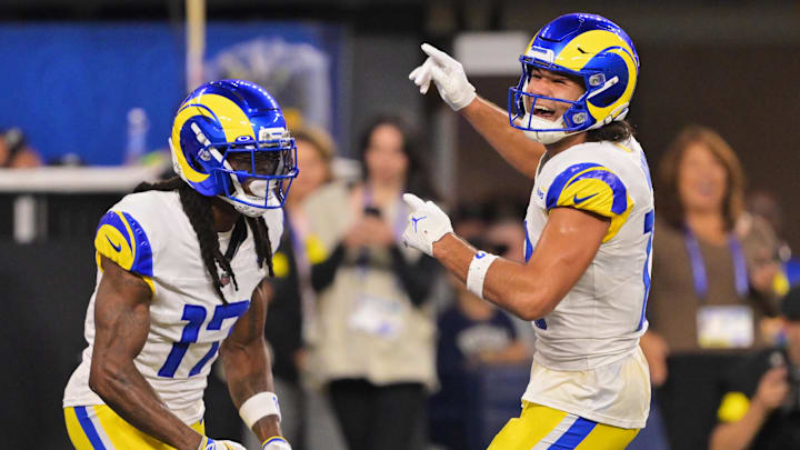 Nov 23, 2025; Inglewood, California, USA; Los Angeles Rams wide receiver Puka Nacua (12) celebrates with wide receiver Davante Adams (17) after Adams scored a touchdown against the Tampa Bay Buccaneers during the second quarter Mandatory Credit: Jayne Kamin-Oncea-Imagn Images