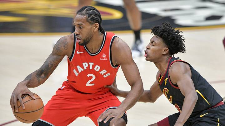 Mar 11, 2019; Cleveland, OH, USA; Toronto Raptors forward Kawhi Leonard (2) dribbles against Cleveland Cavaliers guard Collin Sexton (2) in the first quarter at Quicken Loans Arena. Mandatory Credit: David Richard-USA TODAY Sports Mar 11, 2019; Cleveland, OH, USA; Toronto Raptors forward Kawhi Leonard (2) dribbles against Cleveland Cavaliers guard Collin Sexton (2) in the first quarter at Quicken Loans Arena. Mandatory Credit: David Richard-USA TODAY Sports