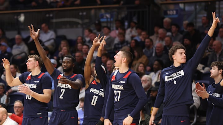 Nov 15, 2025; Villanova, Pennsylvania, USA; The Duquesne Dukes bench react to a three pointer against the Villanova Wildcats during the second half at William B. Finneran Pavilion. Mandatory Credit: Bill Streicher-Imagn Images Nov 15, 2025; Villanova, Pennsylvania, USA; The Duquesne Dukes bench react to a three pointer against the Villanova Wildcats during the second half at William B. Finneran Pavilion. Mandatory Credit: Bill Streicher-Imagn Images