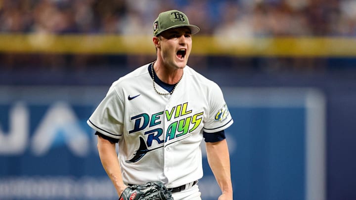 May 19, 2023; St. Petersburg, Florida, USA;  Tampa Bay Rays starting pitcher Shane McClanahan (18) reacts after a strikeout against the Milwaukee Brewers in the seventh inning at Tropicana Field. Mandatory Credit: Nathan Ray Seebeck-Imagn Images