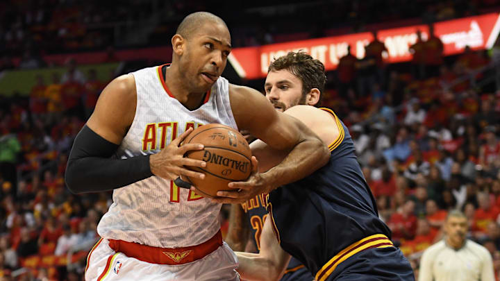 May 6, 2016; Atlanta, GA, USA; Atlanta Hawks center Al Horford (15) and Cleveland Cavaliers forward Kevin Love (0) battle under the basket during the first half in game three of the second round of the NBA Playoffs at Philips Arena. Mandatory Credit: Dale Zanine-Imagn Images