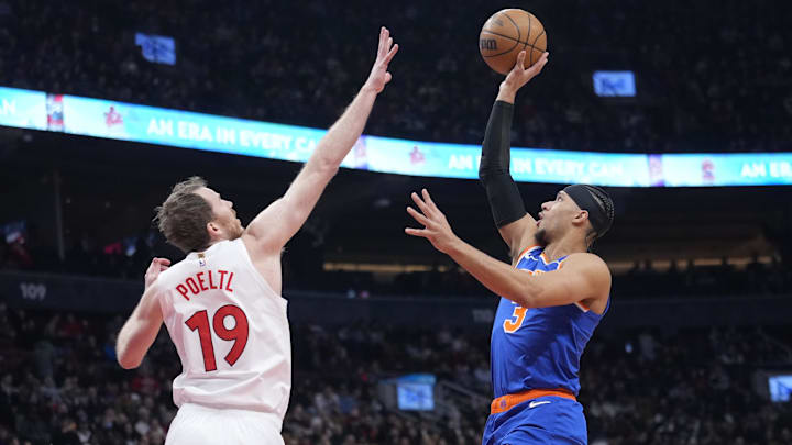 Feb 4, 2025; Toronto, Ontario, CAN; New York Knicks guard Josh Hart (3) goes up to make a basket as Toronto Raptors center Jakob Poeltl (19) defends during the first half at Scotiabank Arena. Mandatory Credit: John E. Sokolowski-Imagn Images Feb 4, 2025; Toronto, Ontario, CAN; New York Knicks guard Josh Hart (3) goes up to make a basket as Toronto Raptors center Jakob Poeltl (19) defends during the first half at Scotiabank Arena. Mandatory Credit: John E. Sokolowski-Imagn Images