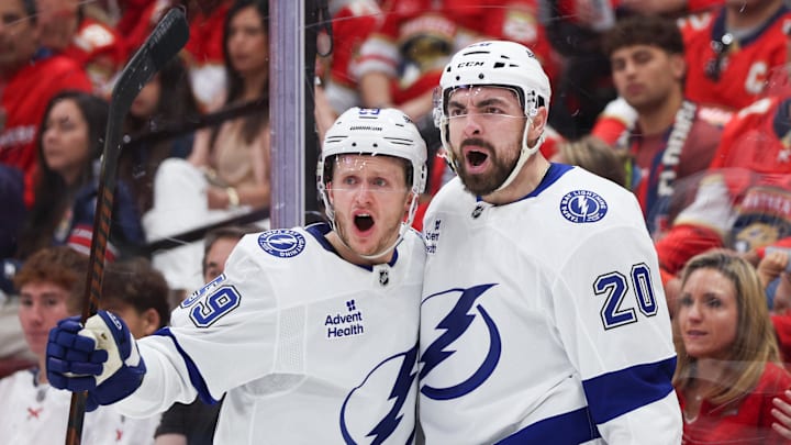 Apr 26, 2025; Sunrise, Florida, USA; Tampa Bay Lightning left wing Nick Paul (20) celebrates with center Jake Guentzel (59) after scoring a goal against the Florida Panthers in the second period during game three of the first round of the 2025 Stanley Cup Playoffs at Amerant Bank Arena. Mandatory Credit: Nathan Ray Seebeck-Imagn Images