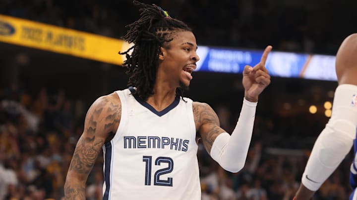 May 1, 2022; Memphis, Tennessee, USA; Memphis Grizzlies guard Ja Morant (12) celebrates making a layup to end the first half against the Golden State Warriors during game one of the second round for the 2022 NBA playoffs at FedExForum. Mandatory Credit: Joe Rondone-Imagn Images May 1, 2022; Memphis, Tennessee, USA; Memphis Grizzlies guard Ja Morant (12) celebrates making a layup to end the first half against the Golden State Warriors during game one of the second round for the 2022 NBA playoffs at FedExForum. Mandatory Credit: Joe Rondone-Imagn Images