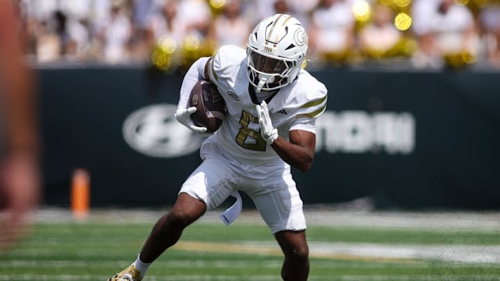 Sep 13, 2025; Atlanta, Georgia, USA; Georgia Tech Yellow Jackets wide receiver Malik Rutherford (8) runs after a catch against the Clemson Tigers in the second quarter at Bobby Dodd Stadium at Hyundai Field. Mandatory Credit: Brett Davis-Imagn Images