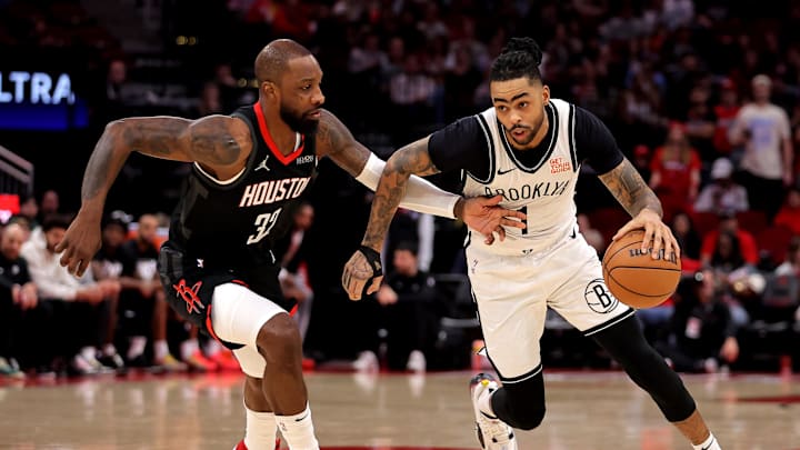 Feb 1, 2025; Houston, Texas, USA; Brooklyn Nets guard D'Angelo Russell (1) drives to the basket against Houston Rockets forward Jeff Green (32) during the third quarter at Toyota Center. Mandatory Credit: Erik Williams-Imagn Images Feb 1, 2025; Houston, Texas, USA; Brooklyn Nets guard D'Angelo Russell (1) drives to the basket against Houston Rockets forward Jeff Green (32) during the third quarter at Toyota Center. Mandatory Credit: Erik Williams-Imagn Images