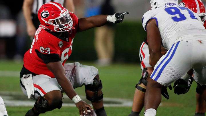 Georgia offensive lineman Sedrick Van Pran (63) gives direction during the second half of a NCAA Georgia offensive lineman Sedrick Van Pran (63) gives direction during the second half of a NCAA
