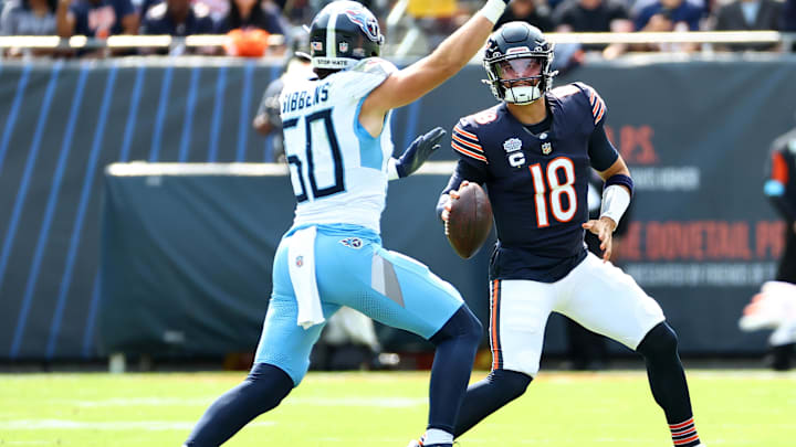 Sep 8, 2024: Chicago Bears quarterback Caleb Williams is pressured by Tennessee Titans linebacker Jack Gibbens during the first quarter at Soldier Field. Sep 8, 2024: Chicago Bears quarterback Caleb Williams is pressured by Tennessee Titans linebacker Jack Gibbens during the first quarter at Soldier Field.