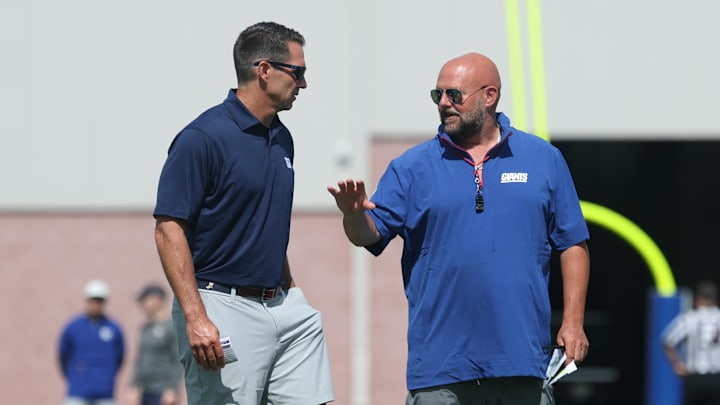 Jul 23, 2025; East Rutherford, NJ, USA; New York Giants general manager Joe Schoen, left, talks with New York Giants head coach Brian Daboll during training camp at Quest Diagnostics Training Center. Mandatory Credit: Vincent Carchietta-Imagn Images