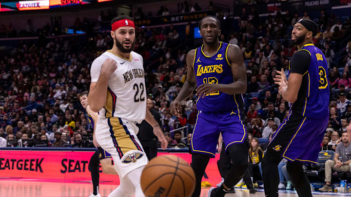 Dec 31, 2023; New Orleans, Louisiana, USA; New Orleans Pelicans forward Larry Nance Jr. (22) and Los Angeles Lakers forward Taurean Prince (12) loose control of a rebound during the second half at Smoothie King Center. Mandatory Credit: Stephen Lew-Imagn Images Dec 31, 2023; New Orleans, Louisiana, USA; New Orleans Pelicans forward Larry Nance Jr. (22) and Los Angeles Lakers forward Taurean Prince (12) loose control of a rebound during the second half at Smoothie King Center. Mandatory Credit: Stephen Lew-Imagn Images