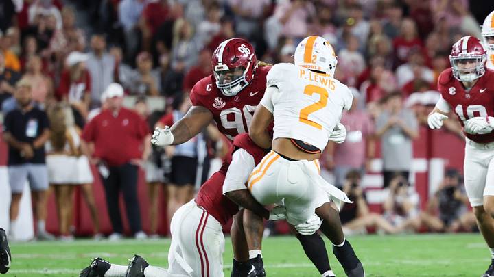 Oct 18, 2025; Tuscaloosa, Alabama, USA; Tennessee Volunteers running back Peyton Lewis (2) is tackled by Alabama Crimson Tide defensive back Keon Sabb (3) during the second quarter at Saban Field at Bryant-Denny Stadium. Mandatory Credit: David Leong-Imagn Images