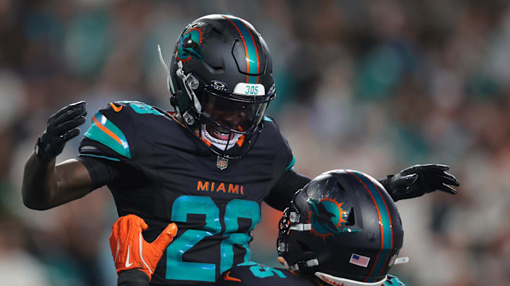 Sep 29, 2025; Miami Gardens, Florida, USA; Miami Dolphins running back De'von Achane (28) reacts after scoring a touchdown against the New York Jets during the second half at Hard Rock Stadium. Mandatory Credit: Sam Navarro-Imagn Images Sep 29, 2025; Miami Gardens, Florida, USA; Miami Dolphins running back De'von Achane (28) reacts after scoring a touchdown against the New York Jets during the second half at Hard Rock Stadium. Mandatory Credit: Sam Navarro-Imagn Images