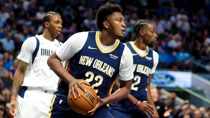 Oct 14, 2026; Dallas, Texas, USA; New Orleans Pelicans center Derik Queen (22) grabs the ball during the second quarter against the Dallas Mavericks at American Airlines Center. Mandatory Credit: Kevin Jairaj-Imagn Images