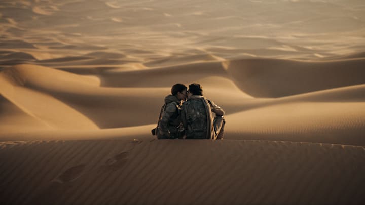 (L-r) ZENDAYA as Chani and TIMOTHÉE CHALAMET as Paul Atreides. in Warner Bros. Pictures and Legendary Pictures’ action adventure “DUNE: PART TWO,” a Warner Bros. Pictures release. Photo Credit: Courtesy Warner Bros. Pictures © 2023 Warner Bros. Entertainment Inc. All Rights Reserved.
