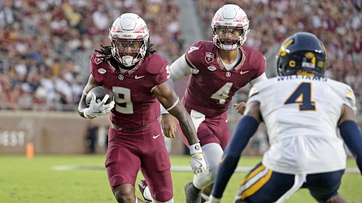 Sep 21, 2024; Tallahassee, Florida, USA; Florida State Seminoles running back Lawrance Toafili (9) runs the ball during the first half against the California Golden Bears at Doak S. Campbell Stadium. Mandatory Credit: Melina Myers-Imagn Images