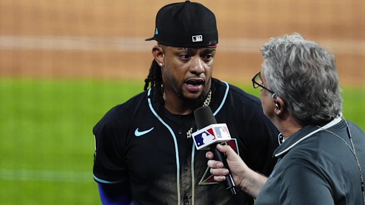Jun 21, 2025; Denver, Colorado, USA; Arizona Diamondbacks second baseman Ketel Marte (4) is interviewed following the win against the Colorado Rockies at Coors Field. Mandatory Credit: Ron Chenoy-Imagn Images