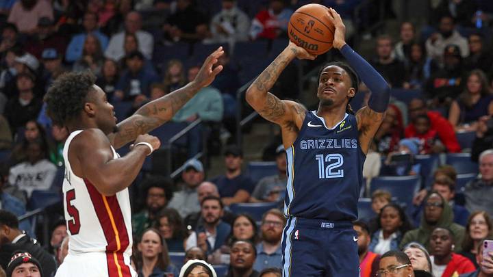 Oct 24, 2025; Memphis, Tennessee, USA; Memphis Grizzlies guard Ja Morant (12) shoots during the third quarter against the Miami Heat at FedExForum. Mandatory Credit: Petre Thomas-Imagn Images