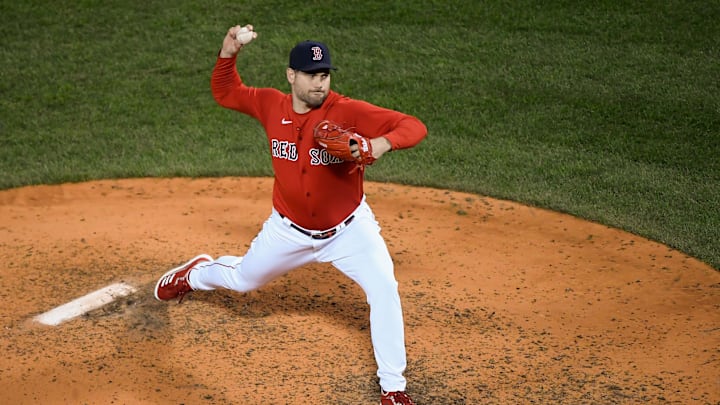 Boston Red Sox relief pitcher Adam Ottavino (0) pitches against the Houston Astros during the sixth inning of game four of the 2021 ALCS at Fenway Park in 2021.