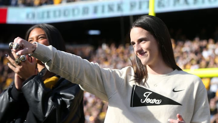 Iowa women’s basketball’s Caitlin Clark shows off her rings during a second quarter timeout during Iowa football’s game against Northwestern Saturday, Oct. 26, 2024 at Kinnick Stadium in Iowa City, Iowa. Iowa women’s basketball’s Caitlin Clark shows off her rings during a second quarter timeout during Iowa football’s game against Northwestern Saturday, Oct. 26, 2024 at Kinnick Stadium in Iowa City, Iowa.