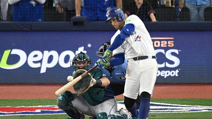 Oct 20, 2025; Toronto, Ontario, CAN; Toronto Blue Jays right fielder George Springer (4) hits a three run home run against the Seattle Mariners in the seventh inning during game seven of the ALCS round for the 2025 MLB playoffs at Rogers Centre. Mandatory Credit: Dan Hamilton-Imagn Images