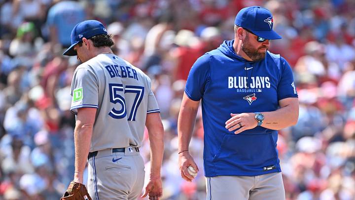 Aug 9, 2026; Philadelphia, Pennsylvania, USA; Toronto Blue Jays manager John Schneider (14) take the ball from pitcher Shane Bieber (57) against the Philadelphia Phillies during the sixth inning at Citizens Bank Park. Mandatory Credit: Eric Hartline-Imagn Images