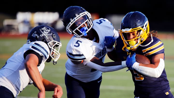 Maddox Harvey, right, carries the ball for Shady Side Academy against Burrell last Friday night at Michael J. Farrell Stadium. The 2-0 Bulldogs beat the Buccaneers 56-26 are a team to keep an eye on in Class 2A.