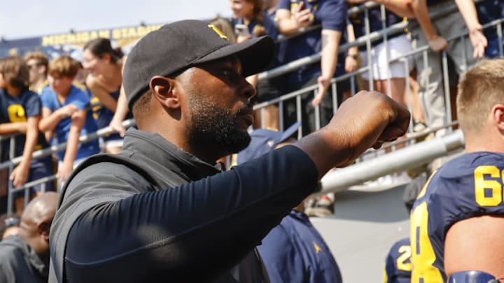 Sep 14, 2024; Ann Arbor, Michigan, USA;  Michigan Wolverines head coach Sherrone Moore walks off the field after a game against the Arkansas State Red Wolves at Michigan Stadium. Mandatory Credit: Rick Osentoski-Imagn Images
