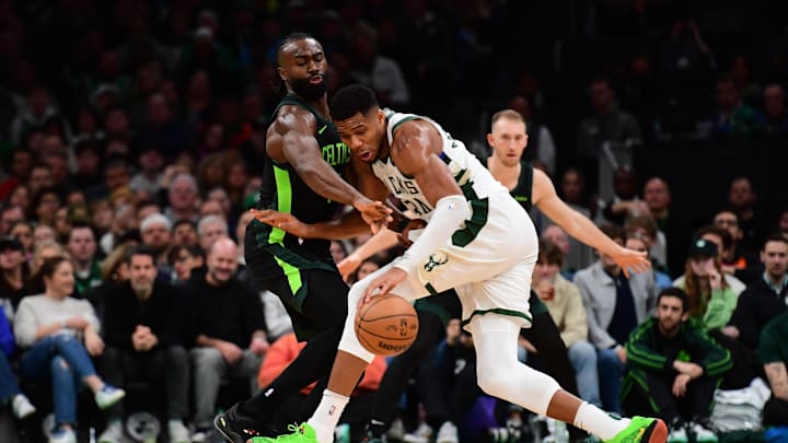 Dec 6, 2024; Boston, Massachusetts, USA; Boston Celtics guard Jaylen Brown (7) tries to steal the ball from Milwaukee Bucks forward Giannis Antetokounmpo (34) during the second half at TD Garden. Mandatory Credit: Bob DeChiara-Imagn Images Dec 6, 2024; Boston, Massachusetts, USA; Boston Celtics guard Jaylen Brown (7) tries to steal the ball from Milwaukee Bucks forward Giannis Antetokounmpo (34) during the second half at TD Garden. Mandatory Credit: Bob DeChiara-Imagn Images
