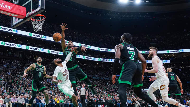 May 15, 2024; Boston, Massachusetts, USA; Boston Celtics center Al Horford (42) blocks the shot of Cleveland Cavaliers guard Darius Garland in Game 5 at TD Garden.