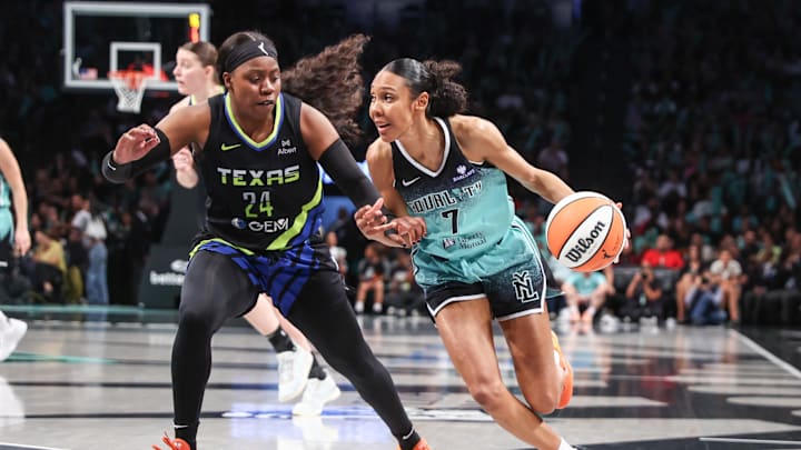 Aug 5, 2025; Brooklyn, New York, USA; New York Liberty guard Rebekah Gardner (7) looks to drive past Dallas Wings guard Arike Ogunbowale (24) in the third quarter at Barclays Center. Mandatory Credit: Wendell Cruz-Imagn Images Aug 5, 2025; Brooklyn, New York, USA; New York Liberty guard Rebekah Gardner (7) looks to drive past Dallas Wings guard Arike Ogunbowale (24) in the third quarter at Barclays Center. Mandatory Credit: Wendell Cruz-Imagn Images