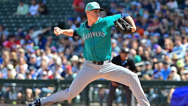 Mar 8, 2024; Mesa, Arizona, USA;  Seattle Mariners starting pitcher Emerson Hancock (62) throws in