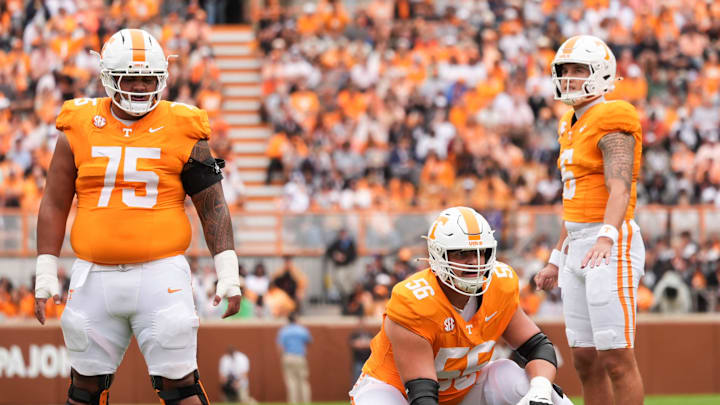 Tennessee offensive linemen Wendell Moe Jr. (75), and Sam Pendleton (56), and quarterback Joey Aguilar (6) wait to line up during the NCAA college football game against ETSU on September 6, 2025, in Knoxville, Tennessee.
