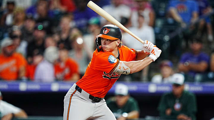 Aug 31, 2024; Denver, Colorado, USA; Baltimore Orioles second base Jackson Holliday (7) at bat in the fifth inning against the Colorado Rockies at Coors Field. Mandatory Credit: Ron Chenoy-Imagn Images