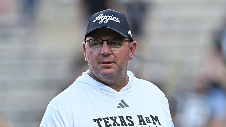 Texas A&M Aggies head coach Mike Elko looks on prior to the game against the Mississippi State Bulldogs at Kyle Field. Texas A&M Aggies head coach Mike Elko looks on prior to the game against the Mississippi State Bulldogs at Kyle Field.