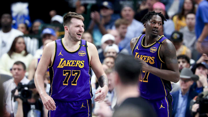 Apr 9, 2025; Dallas, Texas, USA; Los Angeles Lakers guard Luka Doncic (77) laughs with Los Angeles Lakers forward Dorian Finney-Smith (17) against the Dallas Mavericks during the second half at American Airlines Center. Mandatory Credit: Kevin Jairaj-Imagn Images Apr 9, 2025; Dallas, Texas, USA; Los Angeles Lakers guard Luka Doncic (77) laughs with Los Angeles Lakers forward Dorian Finney-Smith (17) against the Dallas Mavericks during the second half at American Airlines Center. Mandatory Credit: Kevin Jairaj-Imagn Images